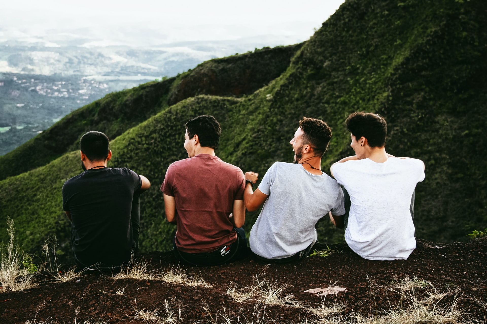 Why is it so hard to find a good friend--image of four men experiencing friendship
